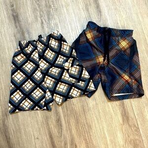 Boys size 6 swim trunks swim suit shorts. Both like new.